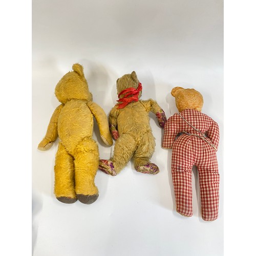 104 - A vintage cot containing Vintage pre-loved Teddy Bears, & two hand puppets