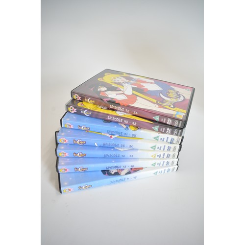 126 - Quantity of manga books and dvds to include cased closed gosho aoyama and naruto unleashed complete ... 