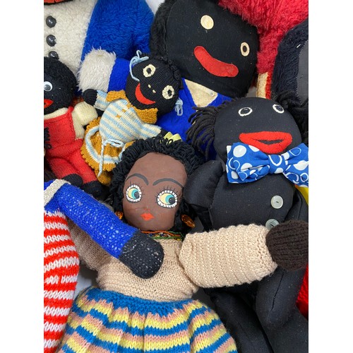 128 - Box full of handcrafted retro gollies
in various materials and an upside-down cloth doll