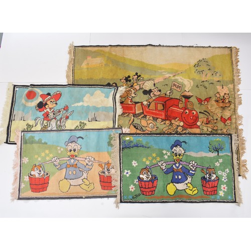 131 - 4 Disney vintage rugs 
2 Donald Duck
1 Mini Mouse
1 showing characters from mid century Disney carto... 