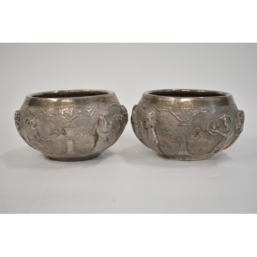 154 - Antique Egyptian embossed bowls (x2) with Sun Worship Scenes, marks to base. approx H9cms.