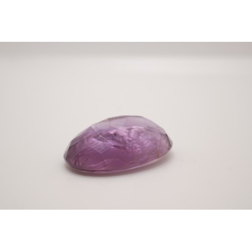 192 - Faceted amethyst cameo, Approx size 2cm x2cm