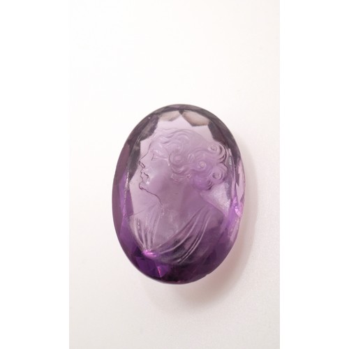 192 - Faceted amethyst cameo, Approx size 2cm x2cm