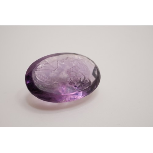 192 - Faceted amethyst cameo, Approx size 2cm x2cm