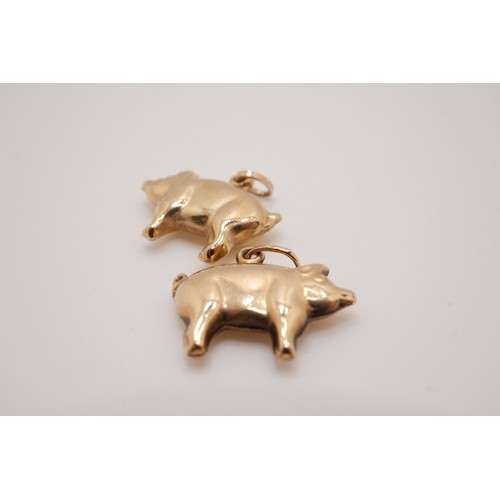 195 - Pair of 9ct yellow gold pig pendants, both stamped 375. Gross combined weight 1.13g