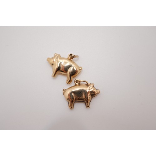 195 - Pair of 9ct yellow gold pig pendants, both stamped 375. Gross combined weight 1.13g