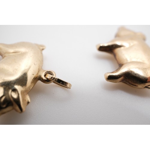 195 - Pair of 9ct yellow gold pig pendants, both stamped 375. Gross combined weight 1.13g