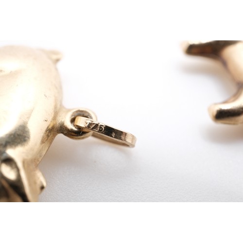 195 - Pair of 9ct yellow gold pig pendants, both stamped 375. Gross combined weight 1.13g