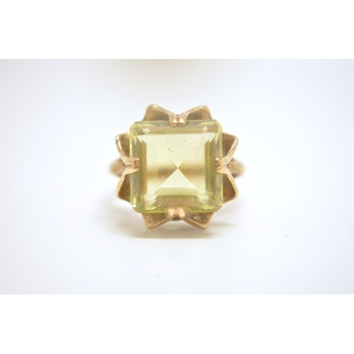 202 - 9ct yellow gold cocktail ring with rectangular yellow stone size N.