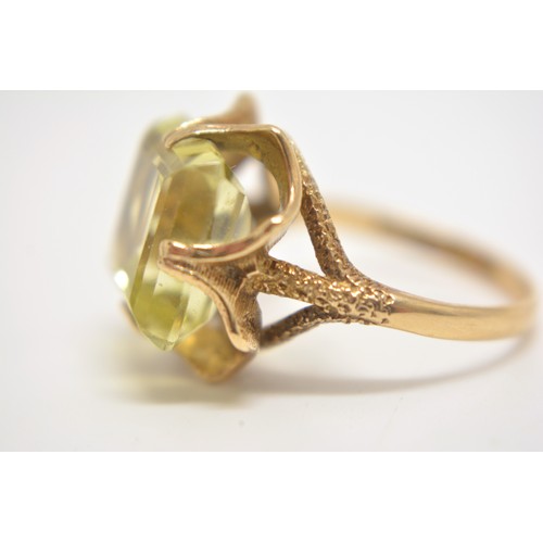 202 - 9ct yellow gold cocktail ring with rectangular yellow stone size N.