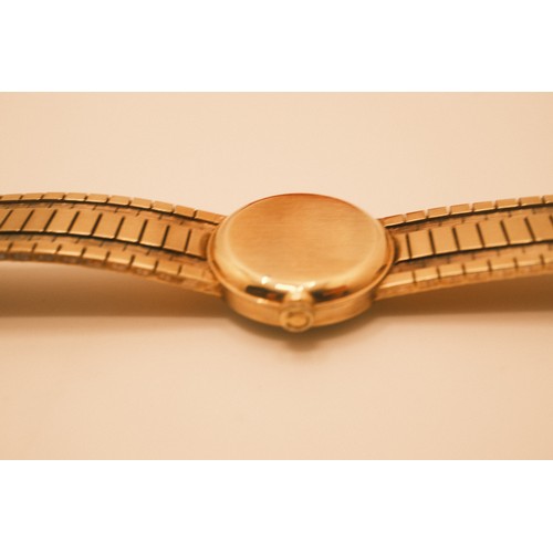 211 - Omega 9ct gold bracelet watch B/W. hallmarked 375 to watch clasp, with original box paperwork