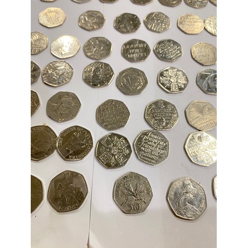 169 - A quantity of 50 pence pieces to include Beatrix Potter, Olympic Games and other themes. x76 coins.