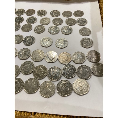 169A - A quantity of 50 pence pieces to include Beatrix Potter, Olympic Games and other themes. x76 coins.