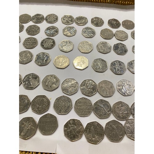 169A - A quantity of 50 pence pieces to include Beatrix Potter, Olympic Games and other themes. x76 coins.