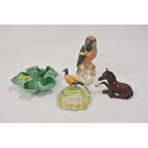 4 - A group of animal themed related ceramics to include Goebel, Beswick, Doulton and one other majolia ... 