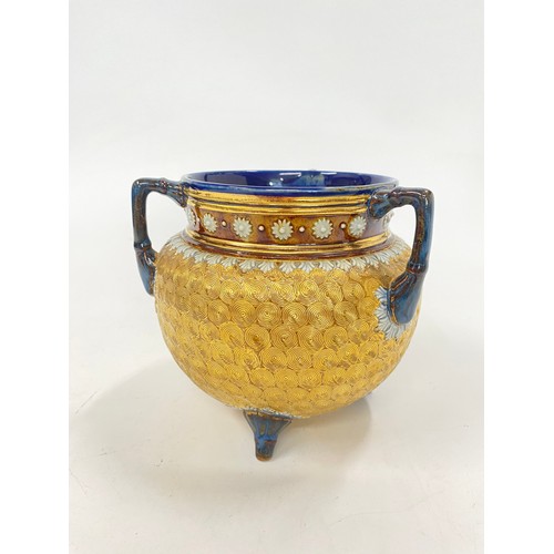 5 - A Doulton stoneware Cauldron vase, with a decorative gilt swirl pattern with a freeze of delicate fl... 