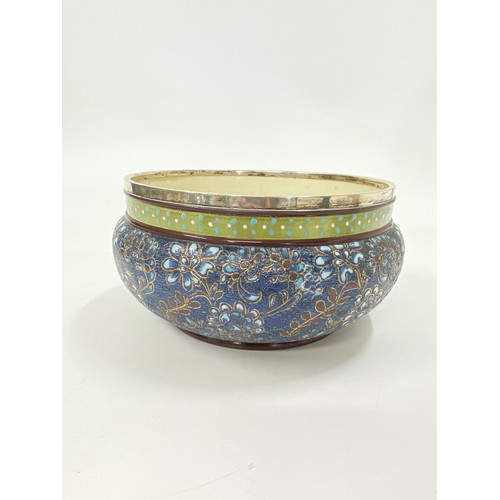 9 - An early 20th-century ceramic salad/fruit bowl, decorated with blue and gold flowers. A freeze of gr... 