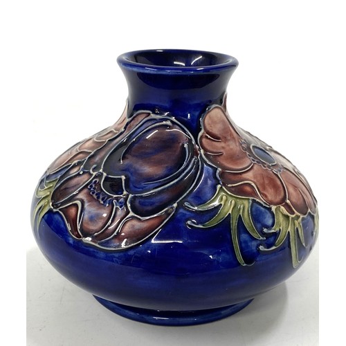 17 - Moorcroft Anenome squat vase signature to the bottom in blue. Approx H11cm.