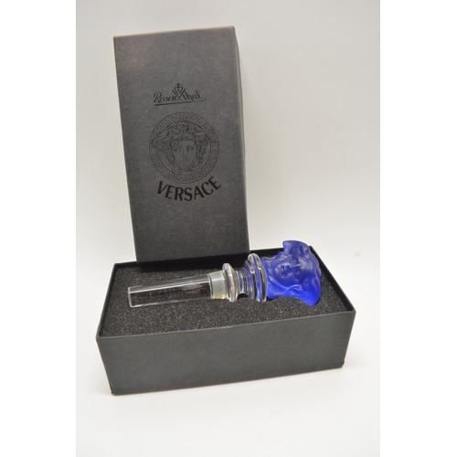 56 - Rosenthal Crystal Versace blue Wine Bottle Stopper with Medusa head together with a selection of pap... 