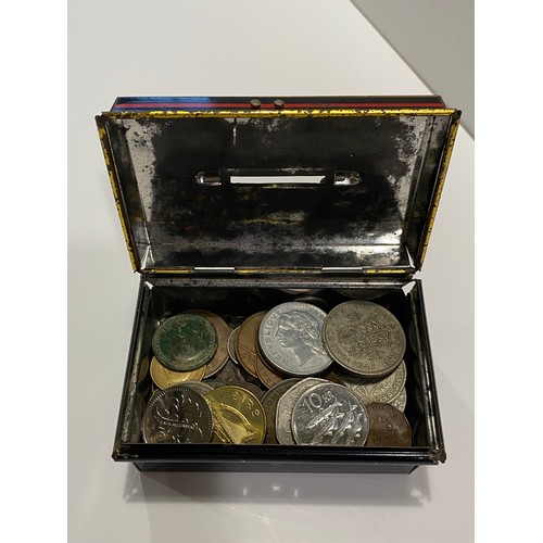 79 - Vintage small tin containing a mixture of English and coins from around the world to include medalli... 