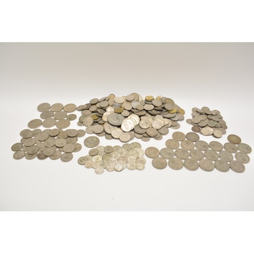 83 - Mixed British and Continental coinage including some silver six pences, shillings and others.