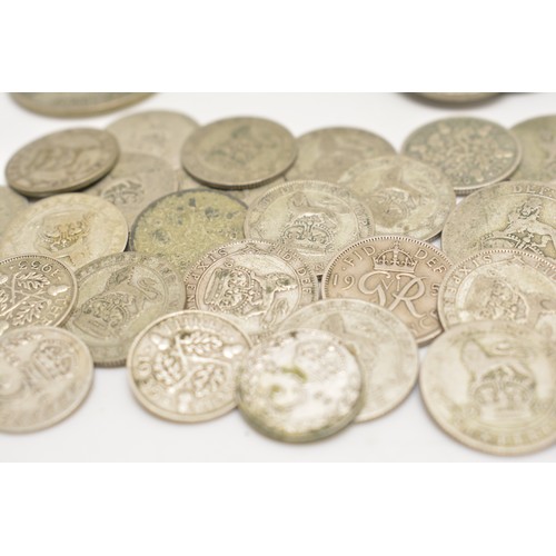 83 - Mixed British and Continental coinage including some silver six pences, shillings and others.