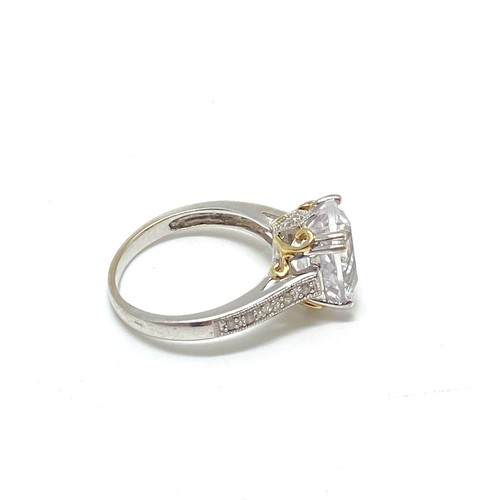 90 - 9ct gold dress ring, diamonds to mount with  central clear Zircon stone in raised claw setting, appr... 