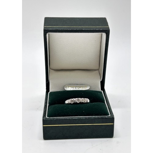 92 - 18ct white gold and diamond trilogy ring, stamped .40, size O/P. Stamped 750 Hallmarked London.