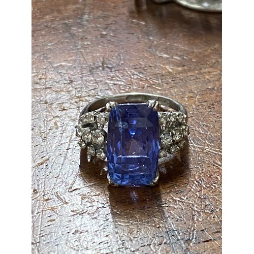 93 - Tanzanite and diamond dress ring,  Very large rectangular-cut central stone with three rows of damon... 