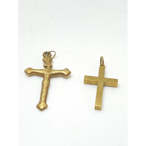 99 - 9ct gold cross pendant, hallmarked 375. weight 4g and one other pendant.