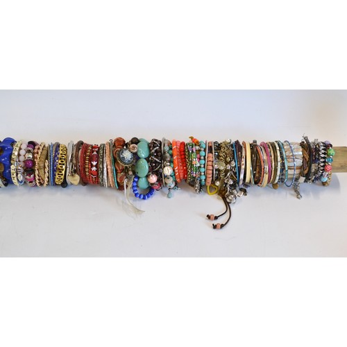 109 - Costume Jewellery collection of  bracelets in  various colours and designs and in excess of 120, [st... 