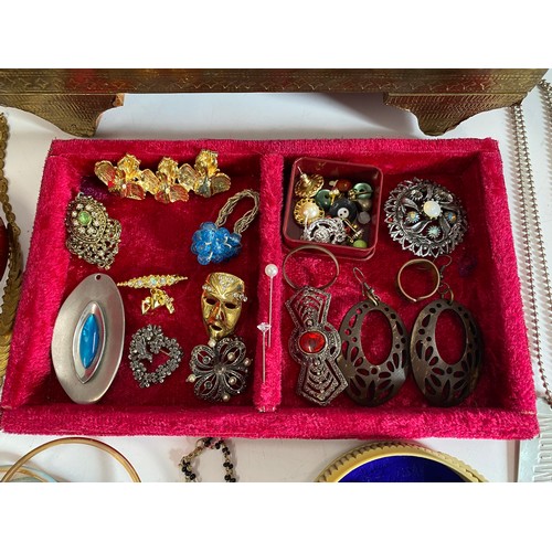 119 - Indian metal jewellery box to include contents. AF.