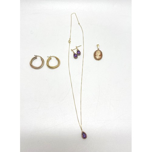 128 - Amethyst and gold necklace and earring set together with cameo and earrings stamped 9ct.