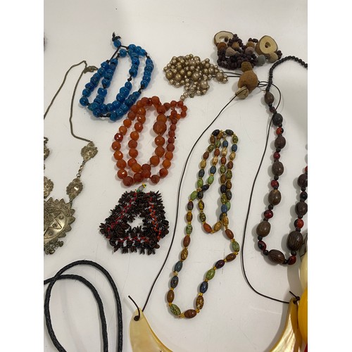 129 - Costume jewellery consisting of some  beaded necklaces, various bangles, rings etc.