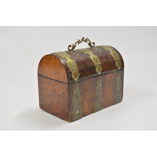 143 - Victorian burr wood effect dome top stationery box/chest with brass decoration and handle.