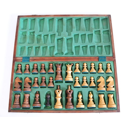 151 - A group of chess Boards/Pieces and boxed Dominos to include folding round chess board housing terrac... 