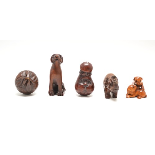 166 - x 5 dark hardwood Netsukes, consisting of an unusual face, a Dog, an Elephant, two puppies (signed) ... 