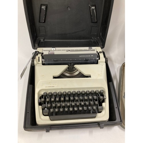 171 - x2 vintage typewriters  with cases, Adler and Olympia