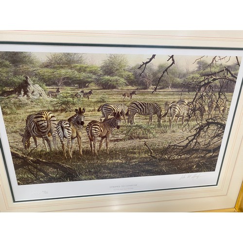 193 - Signed limited edition artwork prints by Alan M Hunt depicting African animals in their living envir... 