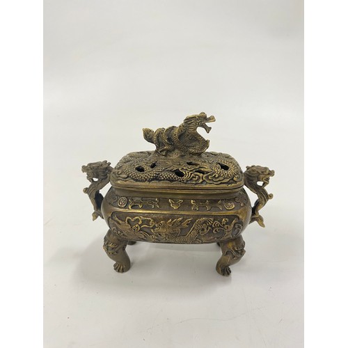 205 - Bronzed oriental incense burner 
with Dragon decoration and handles