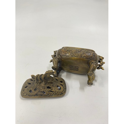 205 - Bronzed oriental incense burner 
with Dragon decoration and handles