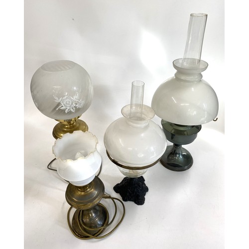 218 - Vintage lamps x4 to include 2 oil lamps complete with shades & Funnels  and 2 brass effect lamps con... 