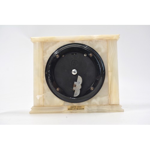 225 - Art Deco Elliott Mantle Clock contained in a White Onyx Case with Malachite stripping, 14cms high. S... 