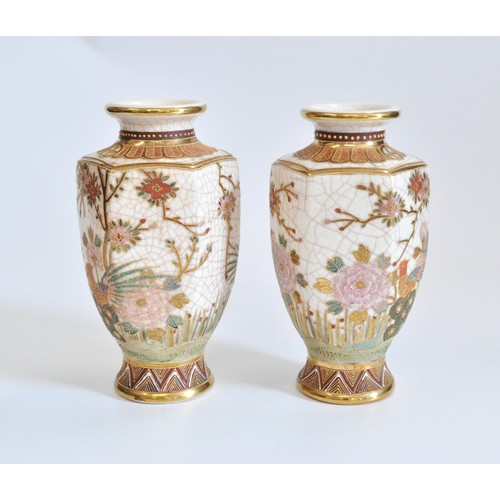 231 - A pair of oriental crackle glazed vases, with peacocks and flower designs, stamp to base. Approx H23... 