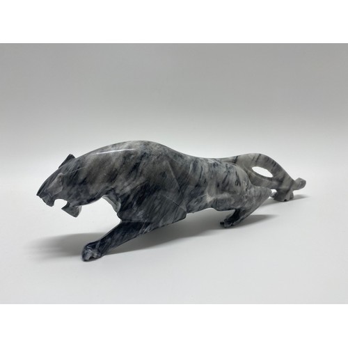 237 - A grey and white stone figure of a growling Jaguar
 L:29cm H:8.5cm approx