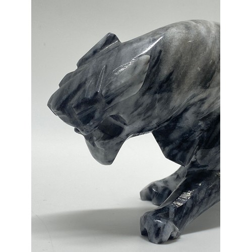 237 - A grey and white stone figure of a growling Jaguar
 L:29cm H:8.5cm approx