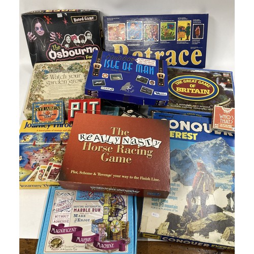 240 - A collection of vintage family games including Conquer Everest, Armchair Cricket, The Osbourne Famil... 