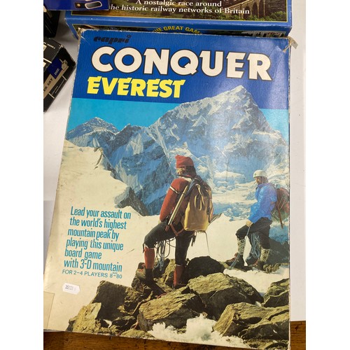 240 - A collection of vintage family games including Conquer Everest, Armchair Cricket, The Osbourne Famil... 