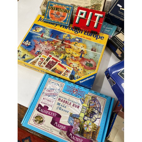 240 - A collection of vintage family games including Conquer Everest, Armchair Cricket, The Osbourne Famil... 