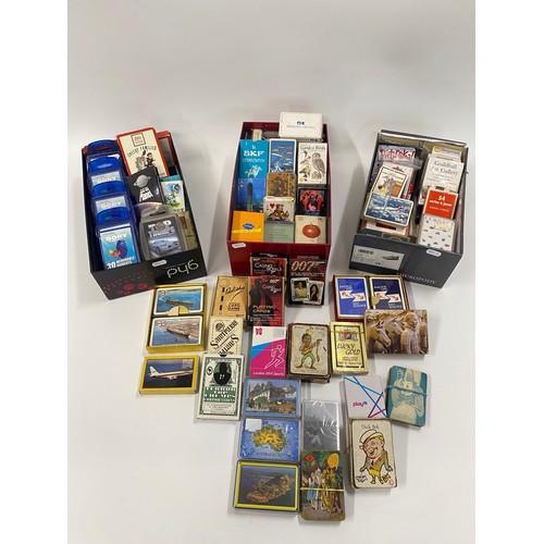 242 - A large quantity of collectable vintage and early 20th Century playing cards and card games includin... 